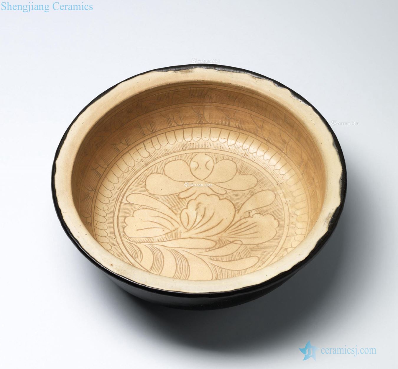 Northern song dynasty/gold Outside the magnetic state kiln carved white lotus in brown grain fold along the basin