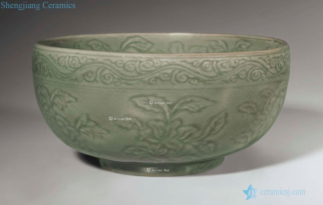 MING DYNASTY, the EARLY 15 th CENTURY A RARE CARVED LONGQUAN CELADON DEEP BOWL