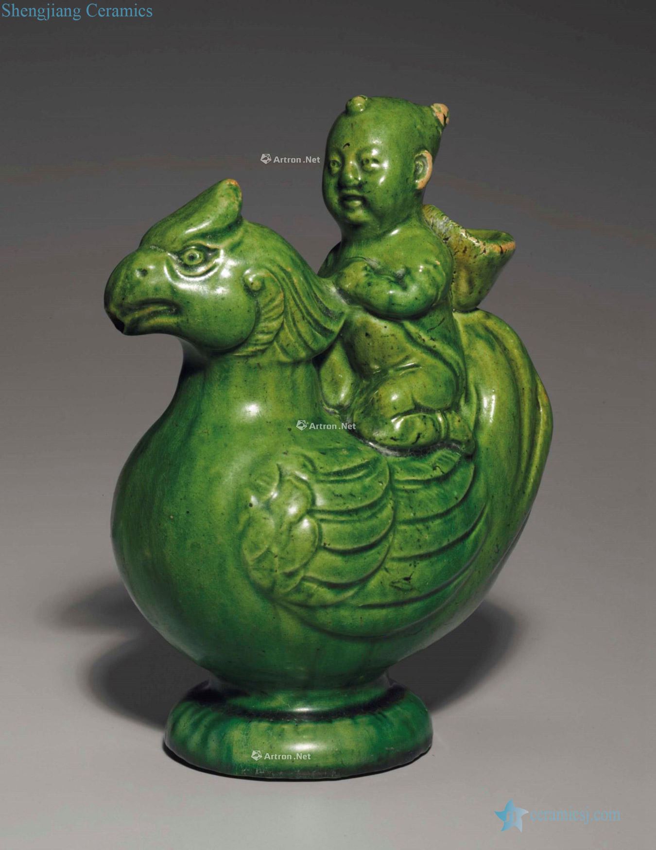 NORTHERN SONG OR LIAO DYNASTY, 10 th ~ 12 th CENTURY A GREEN - GLAZED 'BOY AND PHOENIX "EWER