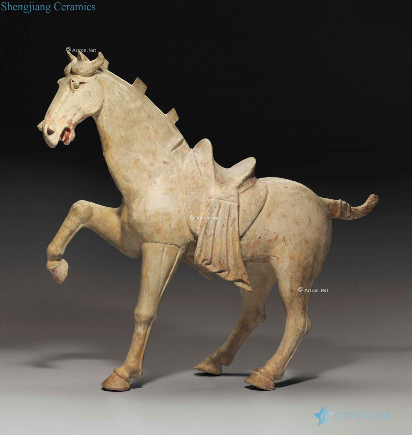 TANG DYNASTY, the 8 th CENTURY A LARGE made POTTERY FIGURE OF A HORSE