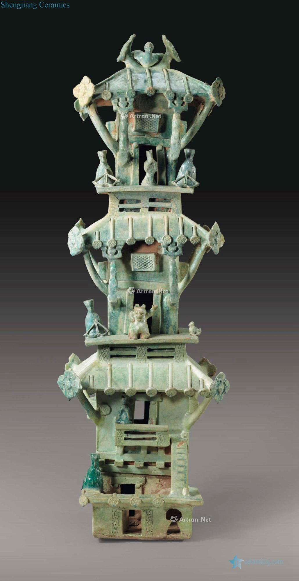 HAN DYNASTY (206 BC - AD 220), A LARGE GREEN - GLAZED POTTERY MODEL OF A TOWER