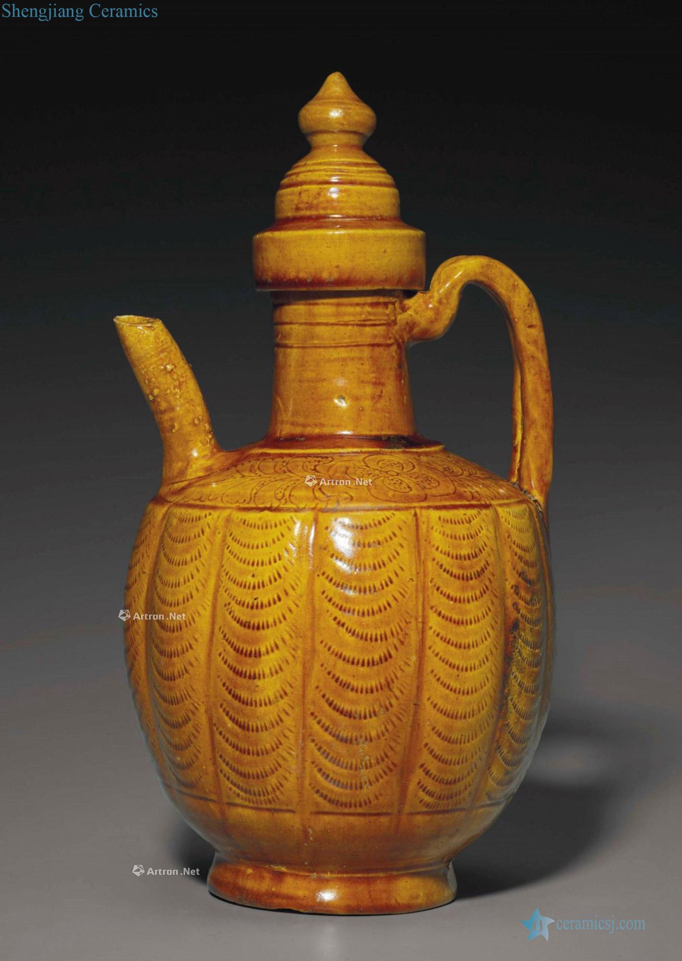 LIAO DYNASTY, 10 th ~ 11 th CENTURY AN AMBER - GLAZED EWER AND COVER