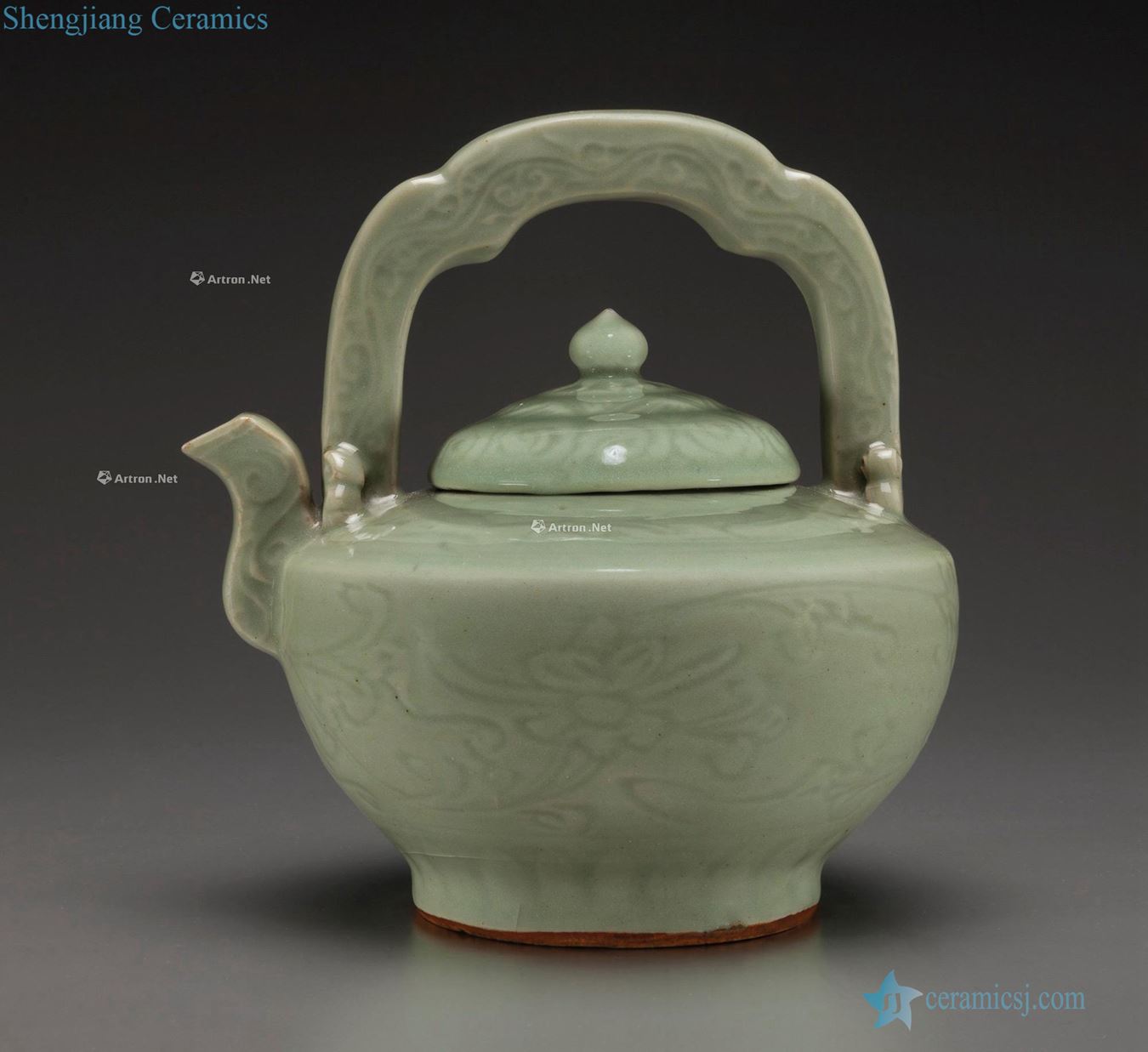 In the Ming dynasty, 15 to 16 century A VERY RARE LONGQUAN CELADON TEAPOT AND COVER