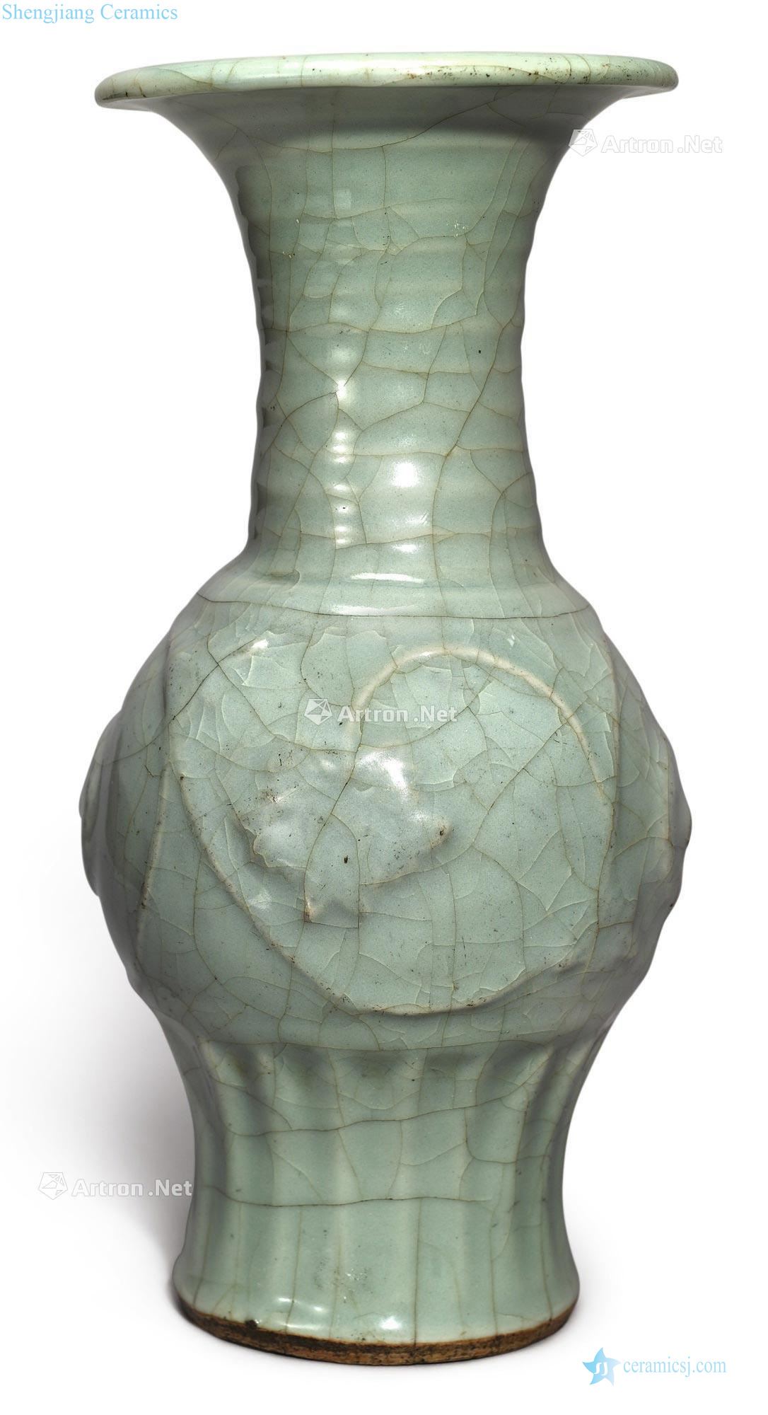 yuan Longquan celadon green glaze paste wrapped flower grain bottle