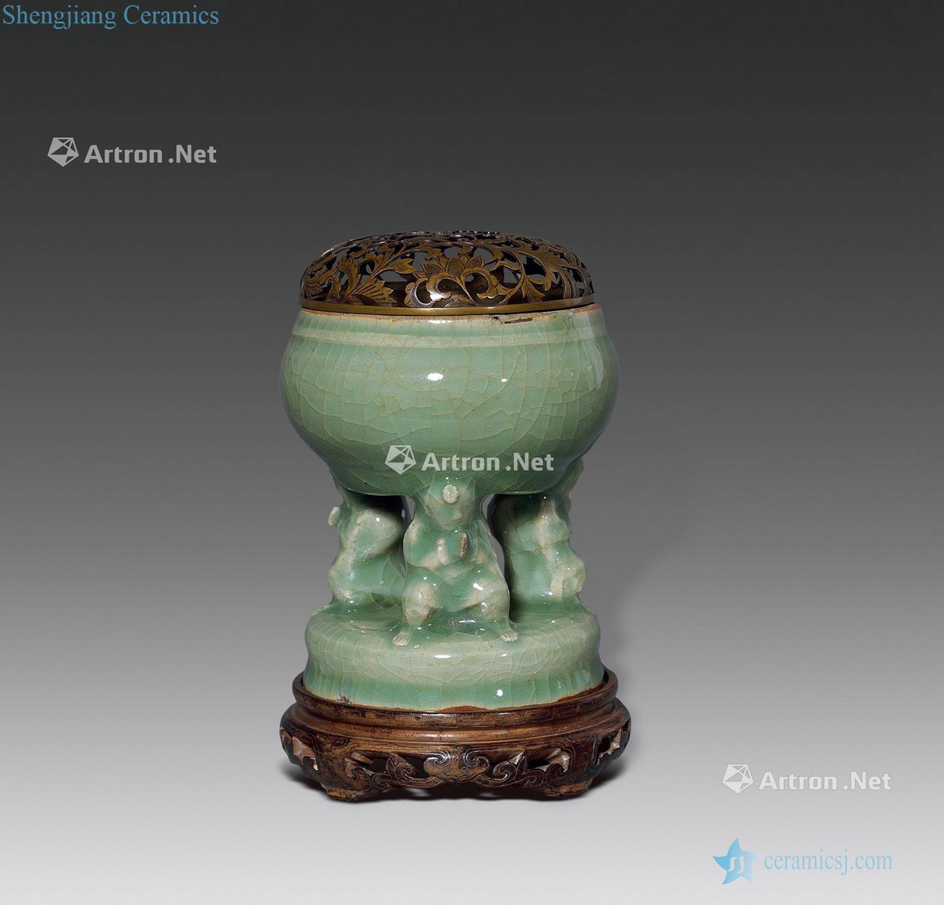 Ming Longquan celadon lad with cylinder of fragrance