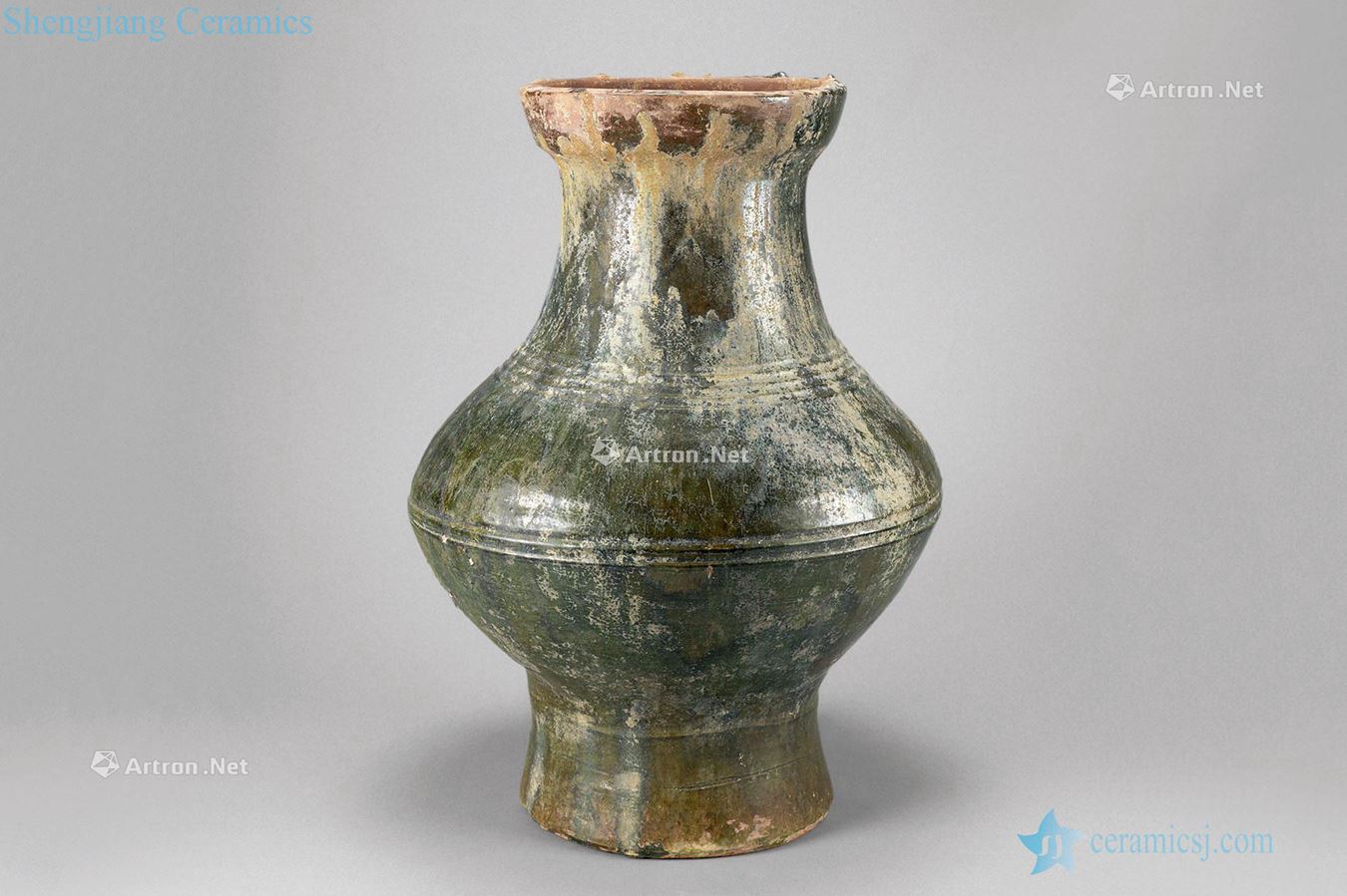 The han dynasty (206 A.D. 220 - b.c) green glaze string lines pot
