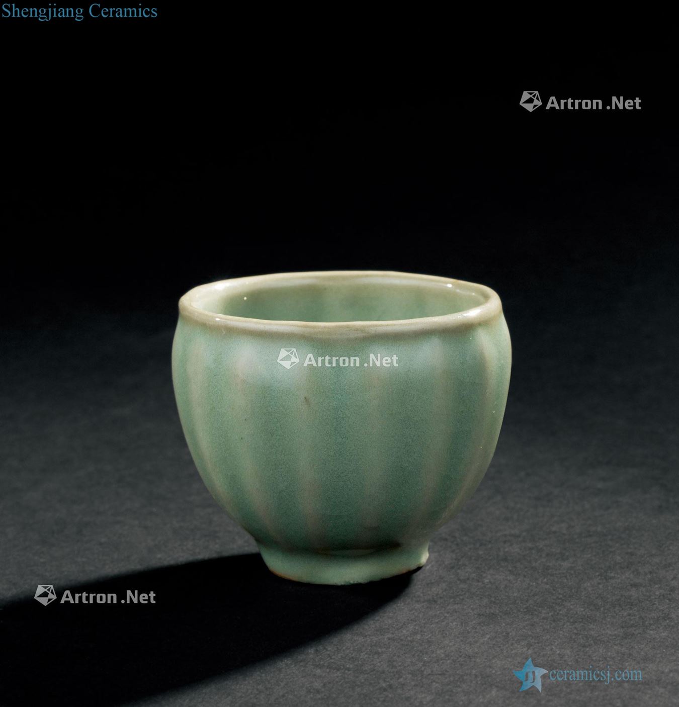 In the Ming dynasty (1368-1644), longquan celadon lotus-shaped grain cup