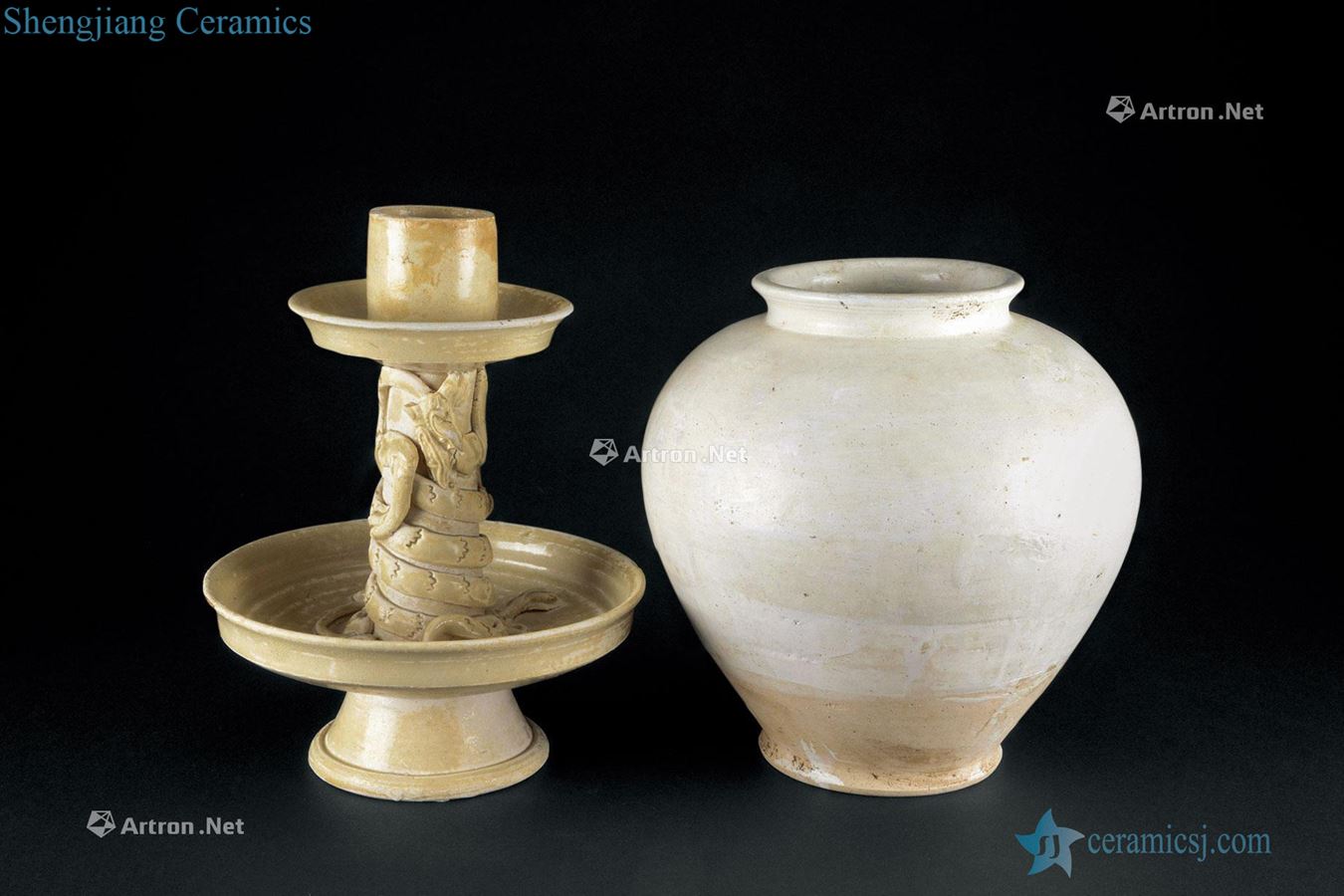 The tang dynasty (618-907) white POTS Two things green glaze panlong candlestick (group a)