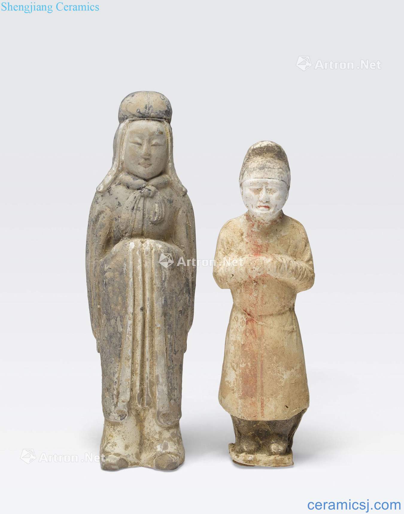The TWO made POTTERY TOMB FIGURES
