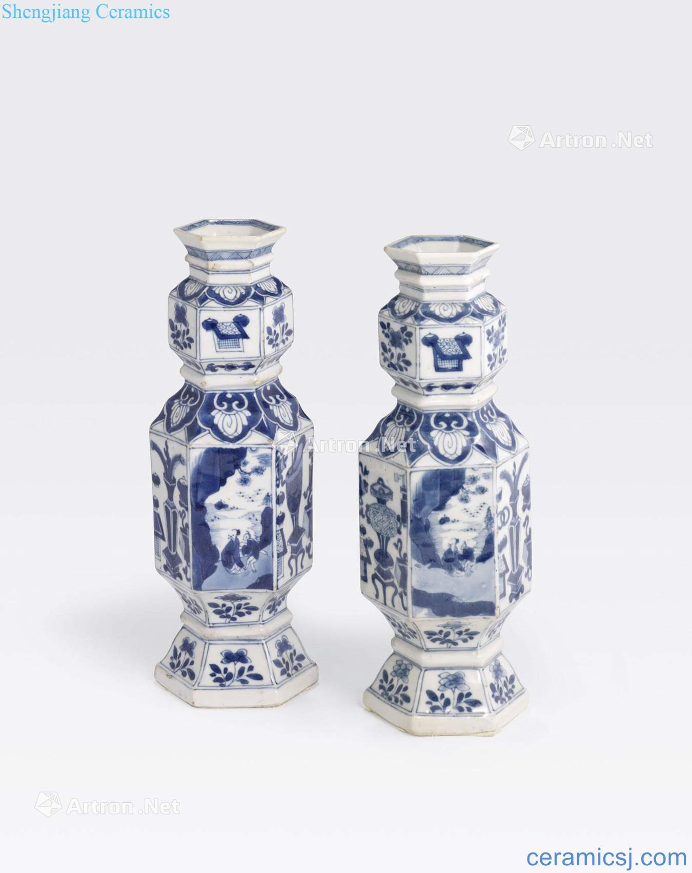 Kangxi period A PAIR OF BLUE AND WHITE HEXAGONAL - SECTIONED VASES
