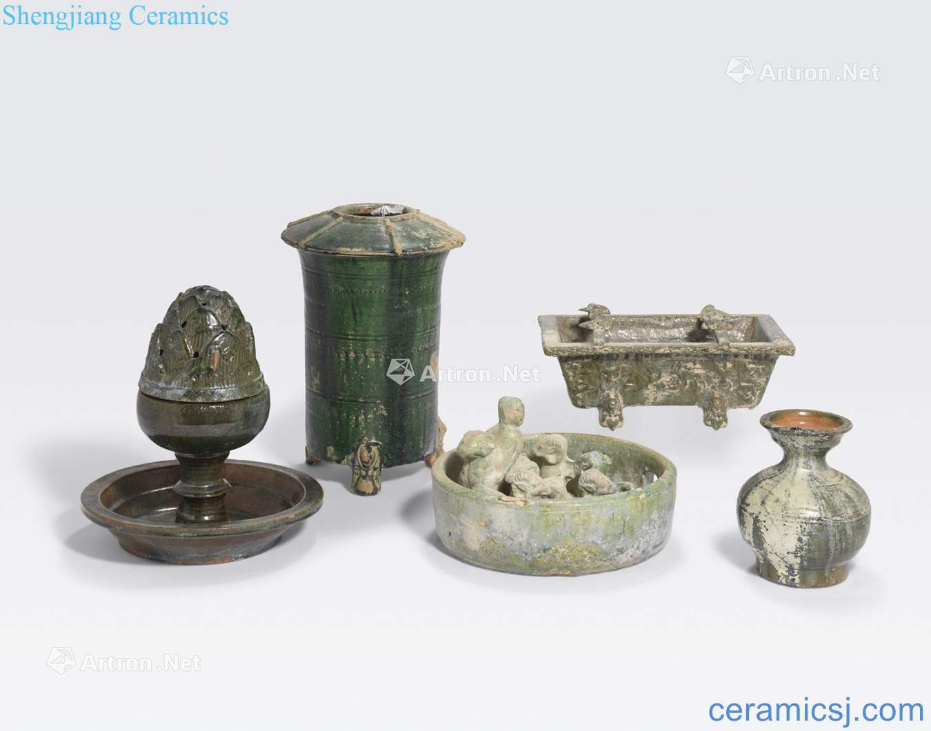 Han dynasty the AN ASSEMBLED GROUP OF FIVE GREEN GLAZED POTTERY FUNERARY MODELS