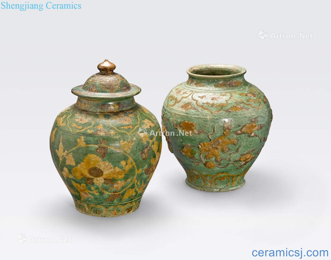 Ming dynasty, the 16 th/17 th century TWO SANCAI GLAZED POTTERY STORAGE JARS AND AN ASSOCIATED LID