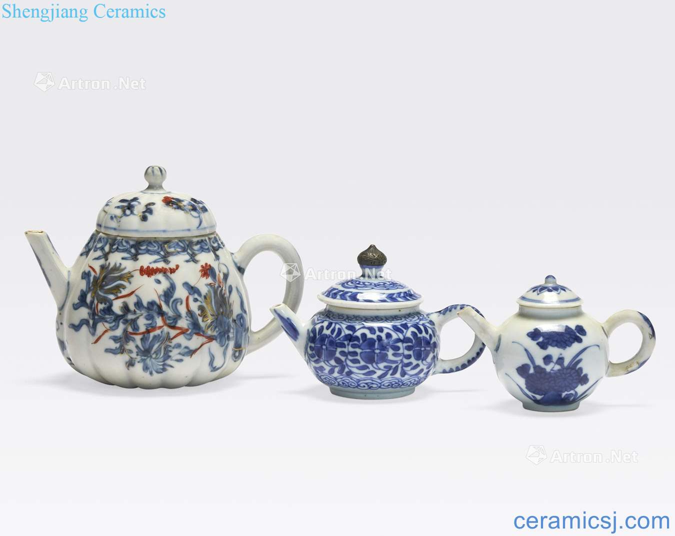 Th 18 and 19 th century A GROUP OF THREE BLUE and WHITE SPOUTED EWERS