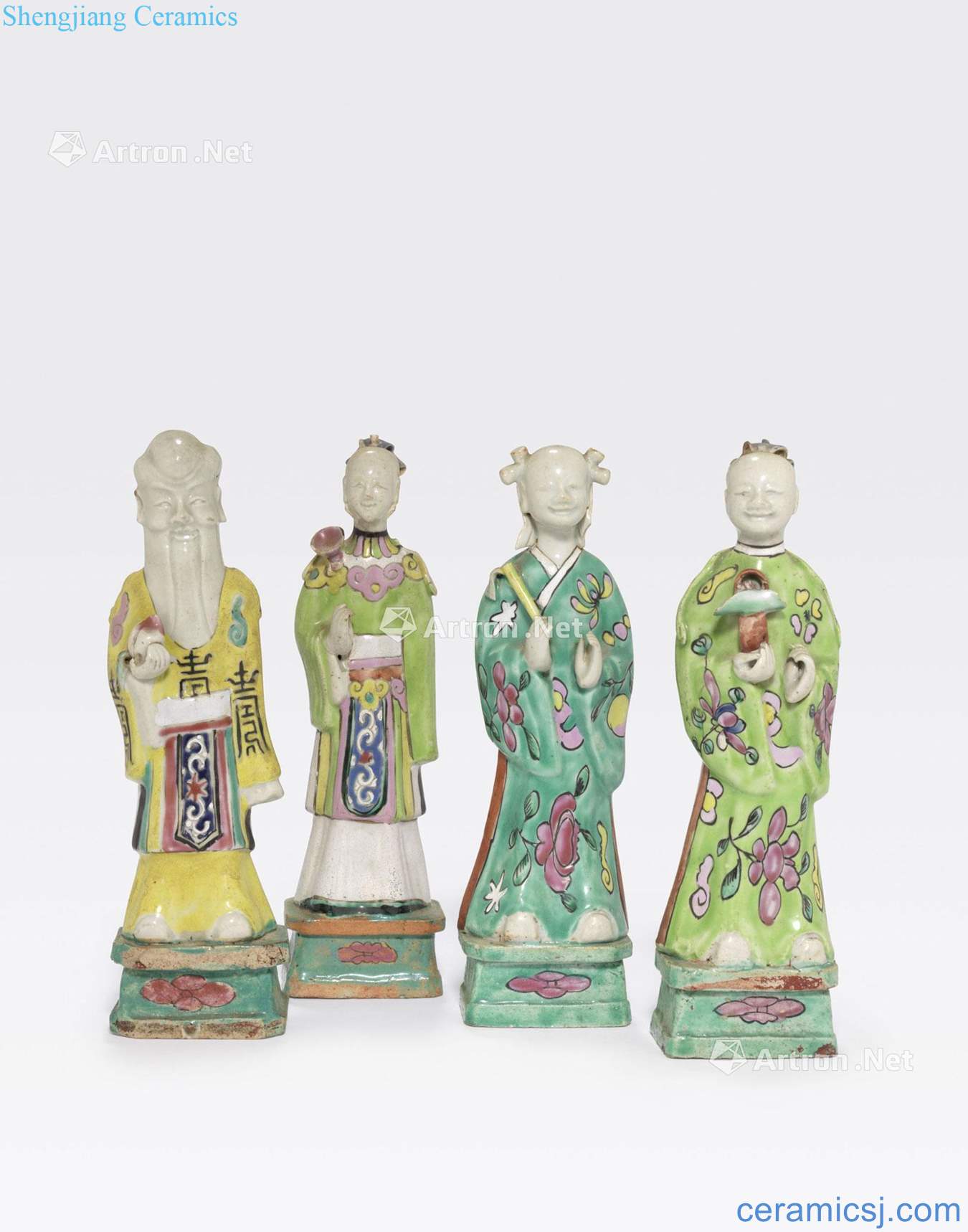 The 19 th century A GROUP OF FOUR FAMILLE ROSE ENAMELED IMMORTALS