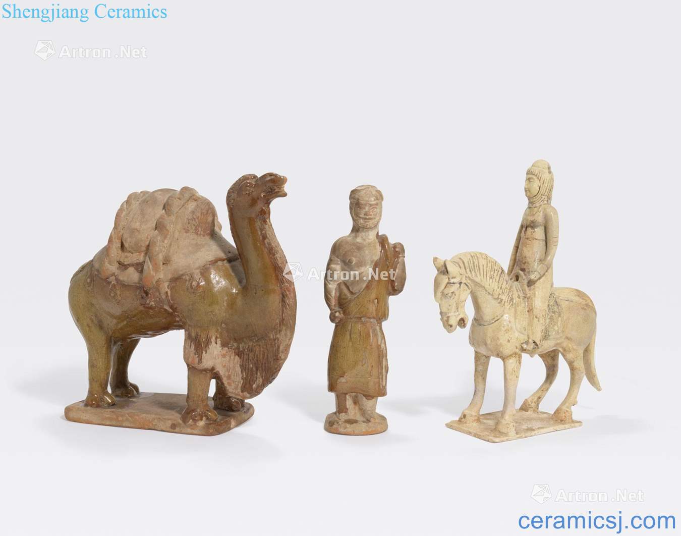 Tang dynasty the AN ASSEMBLED GROUP OF THREE POTTERY TOMB FIGURES
