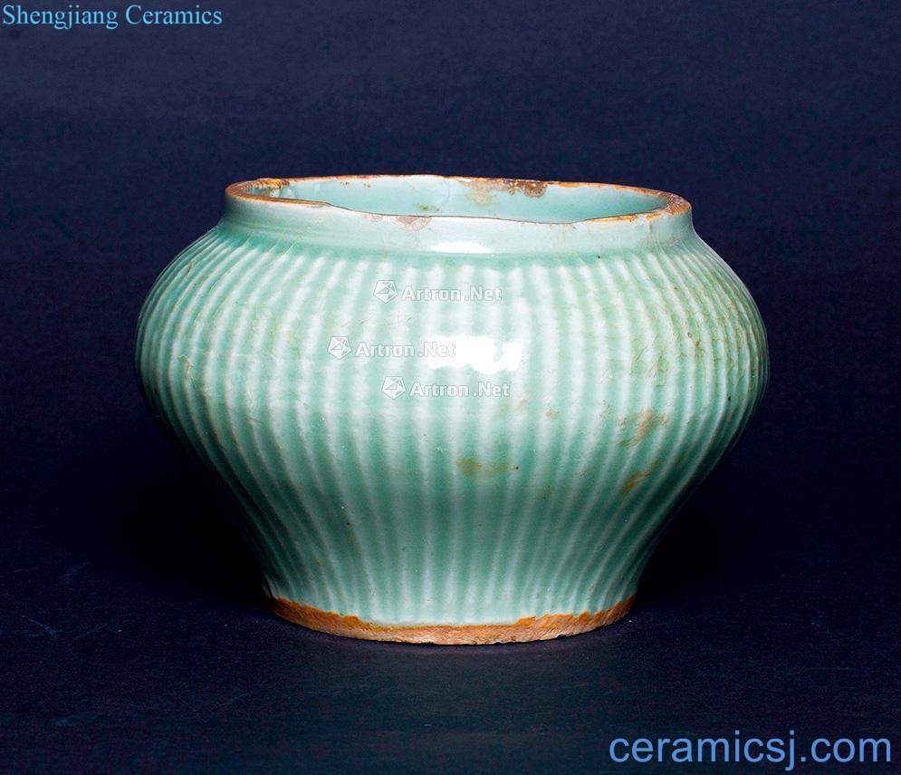 Ming or earlier Longquan celadon green glaze melon leng cans