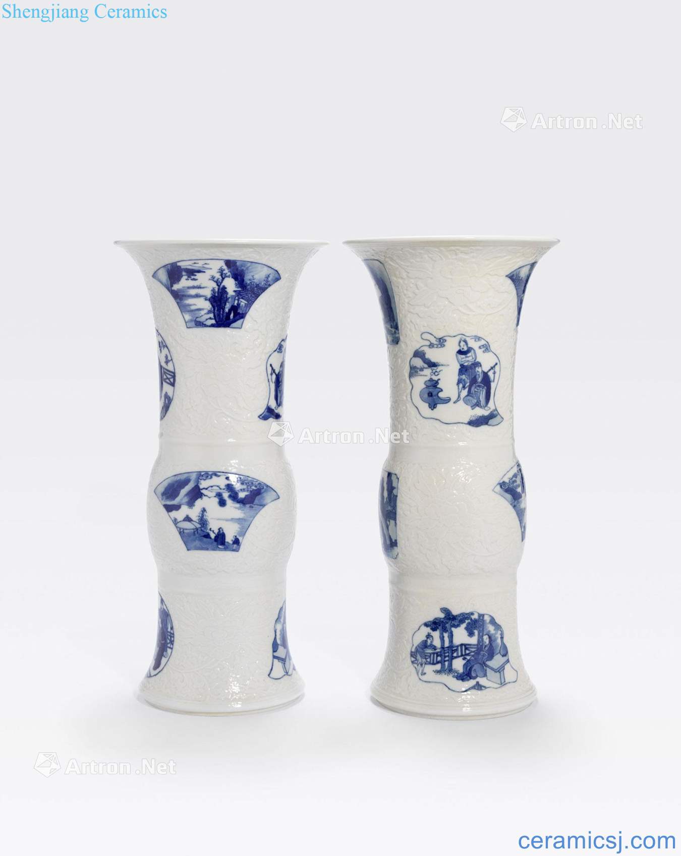 Kangxi period A PAIR OF MOLDED BLUE AND WHITE PORCELAIN BEAKER VASES