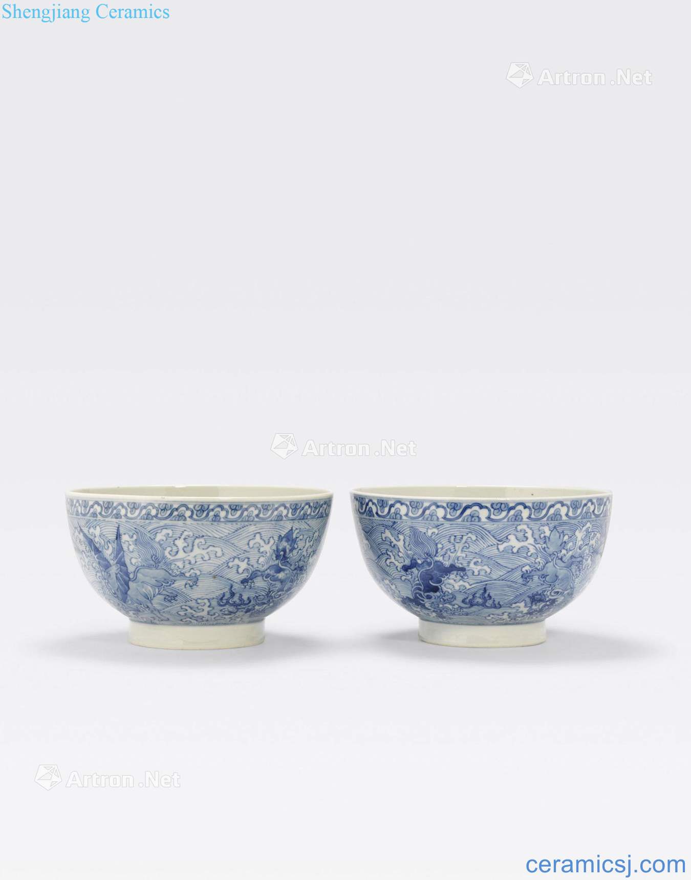 Wanli marks, Kangxi period A PAIR OF BLUE AND WHITE BOWLS DECORATED WITH MYTHICAL BEASTS
