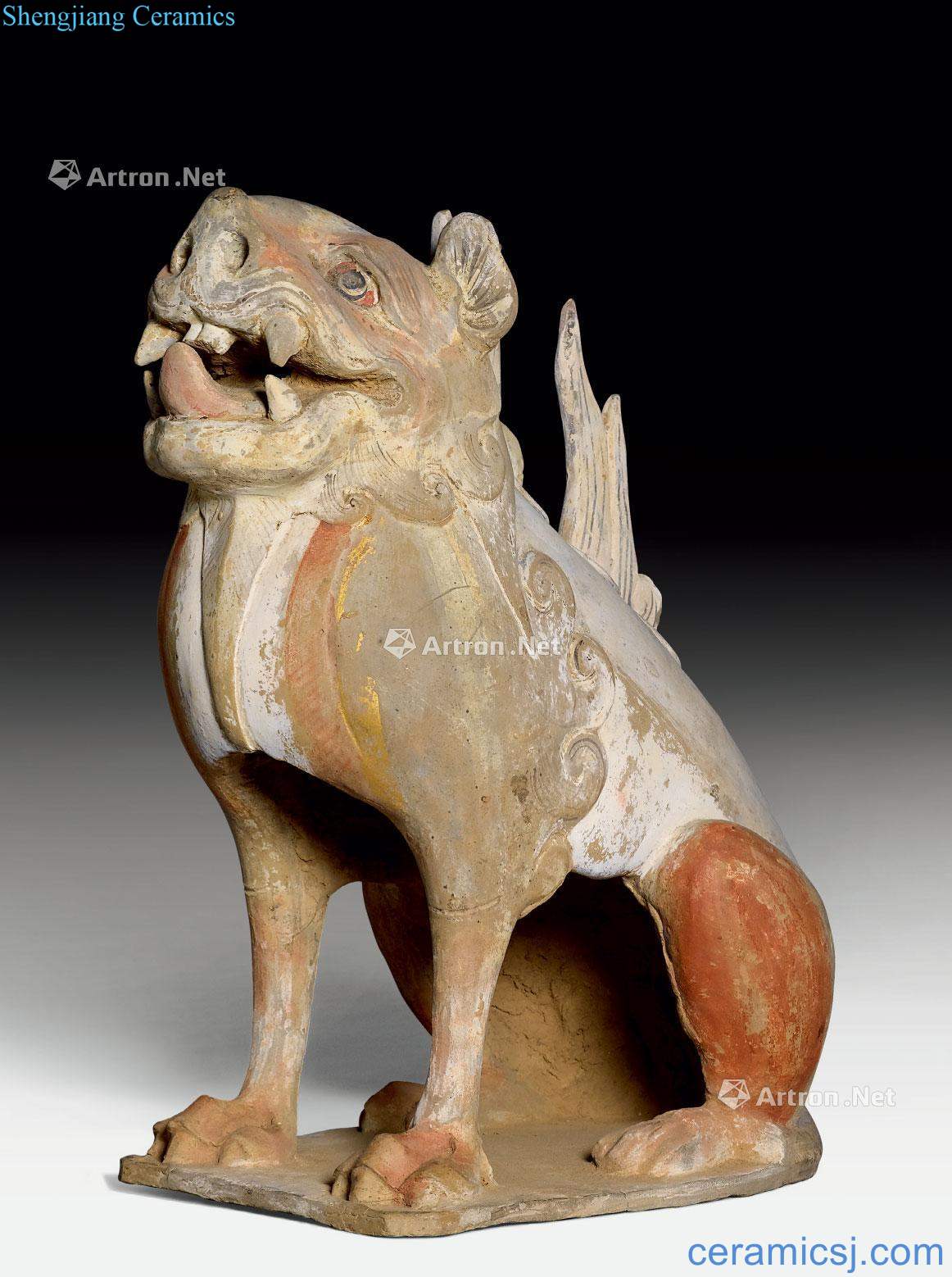 Tang dynasty made A POTTERY FIGURE OF AN EARTH SPIRIT.