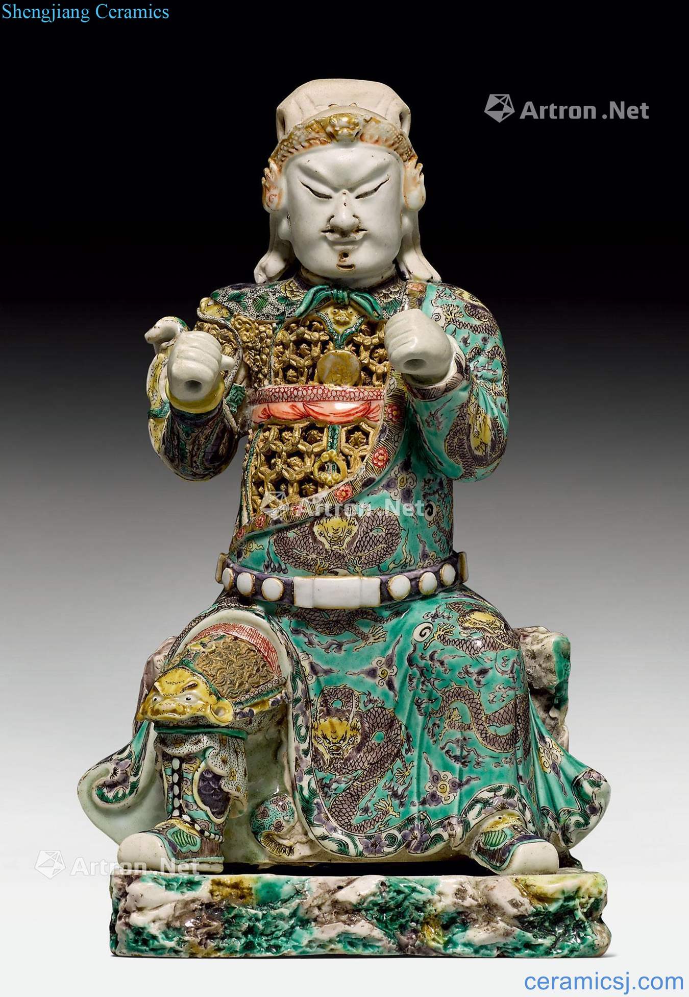 Kangxi period AN EXQUISITE FAMILLE VERTE AND GOLD FIGURE OF GUANDI.