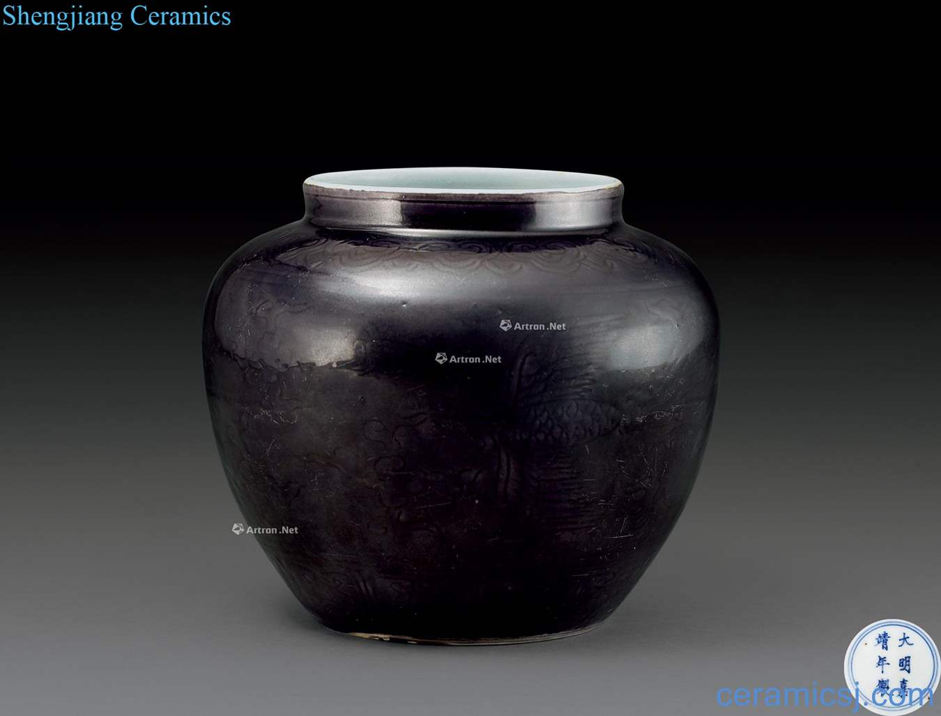 Ming jiajing In tomato skin dark purple glaze carved YunFeng grain tank