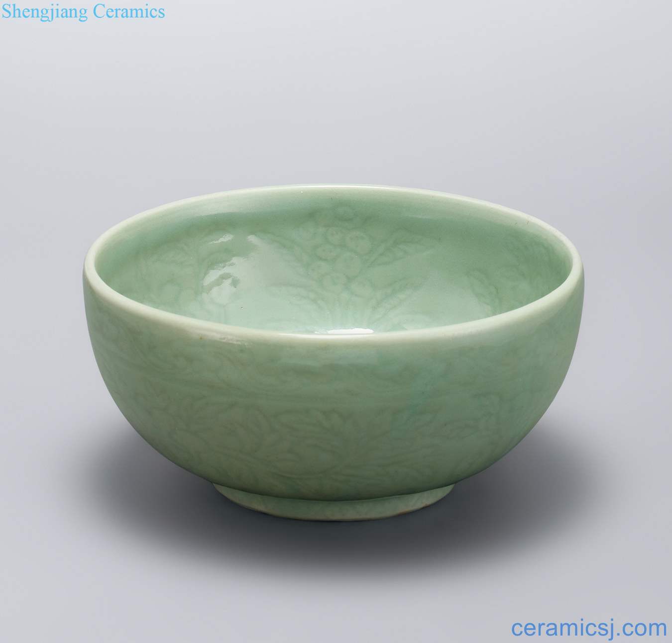 Ming yongle (1402-1424), longquan kiln green glazed carved flowers and folding branches grain pier bowl