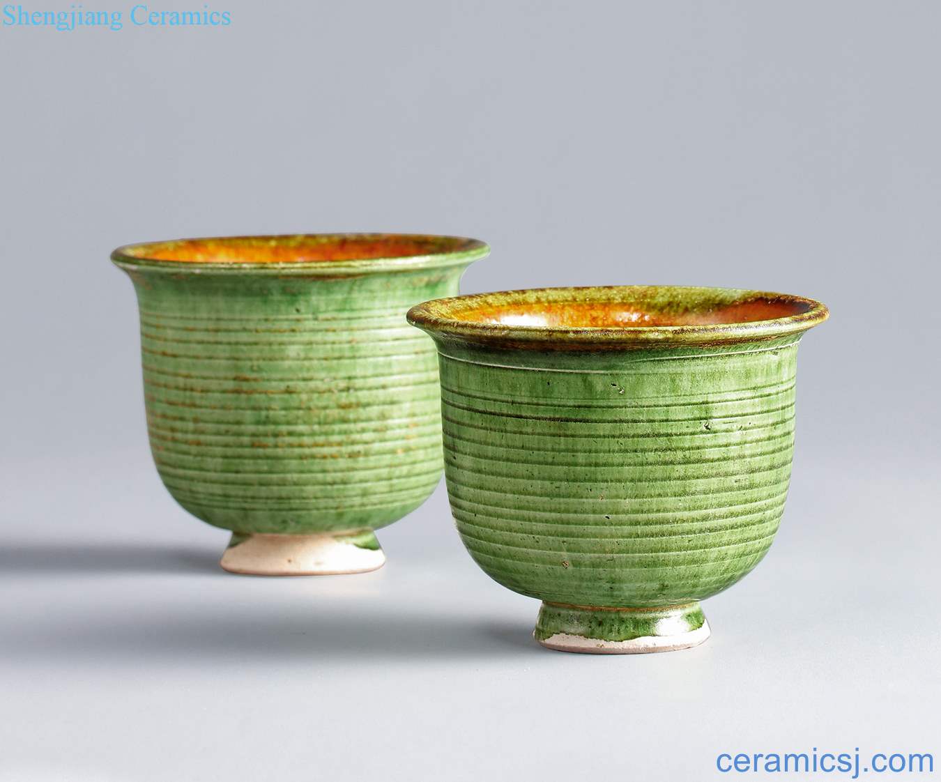 Tang (618-907), ligou kiln green color bowstring grain yellow cup (a)