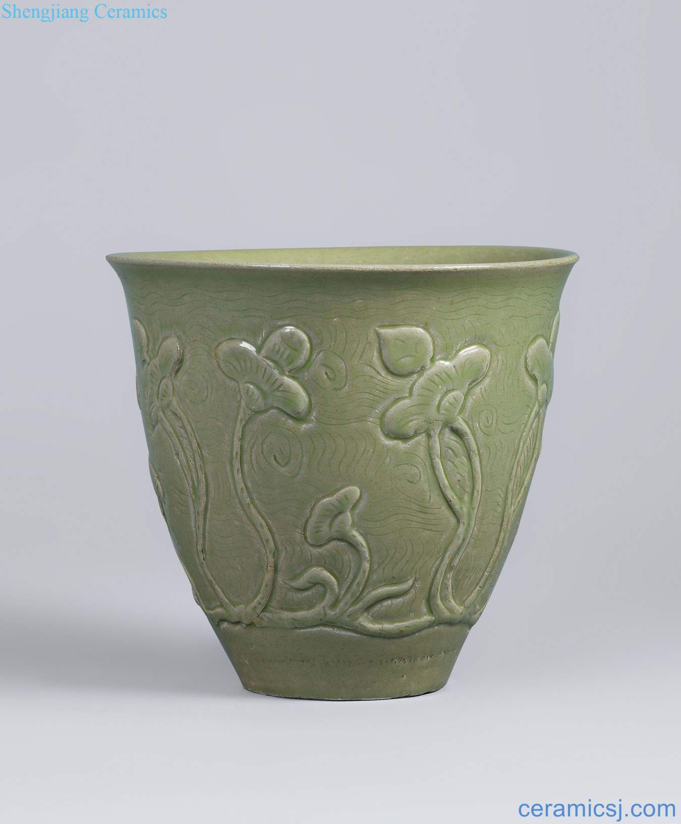 Northern song dynasty (960-1127), the kiln green glaze score Hualien pool grain small cylinder