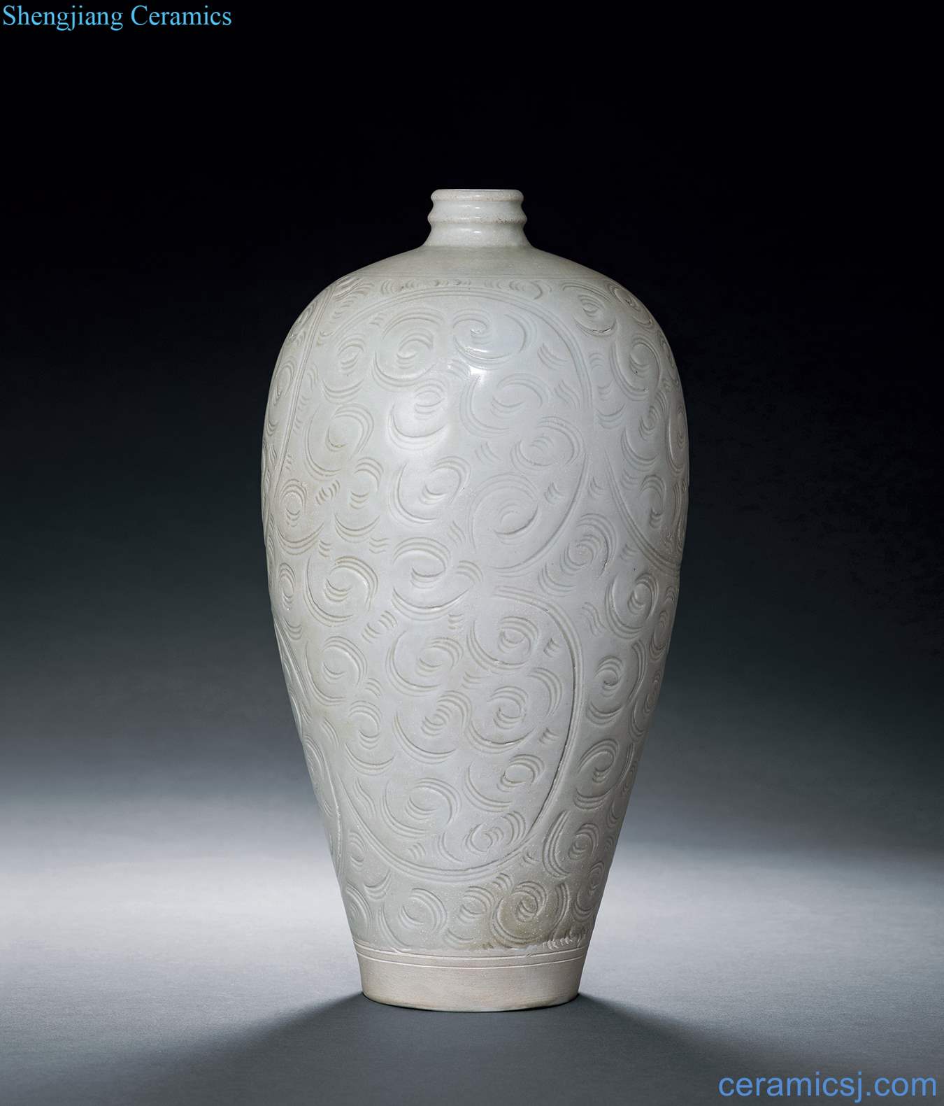 The southern song dynasty Left kiln green plum bottle white glazed carved decorative pattern
