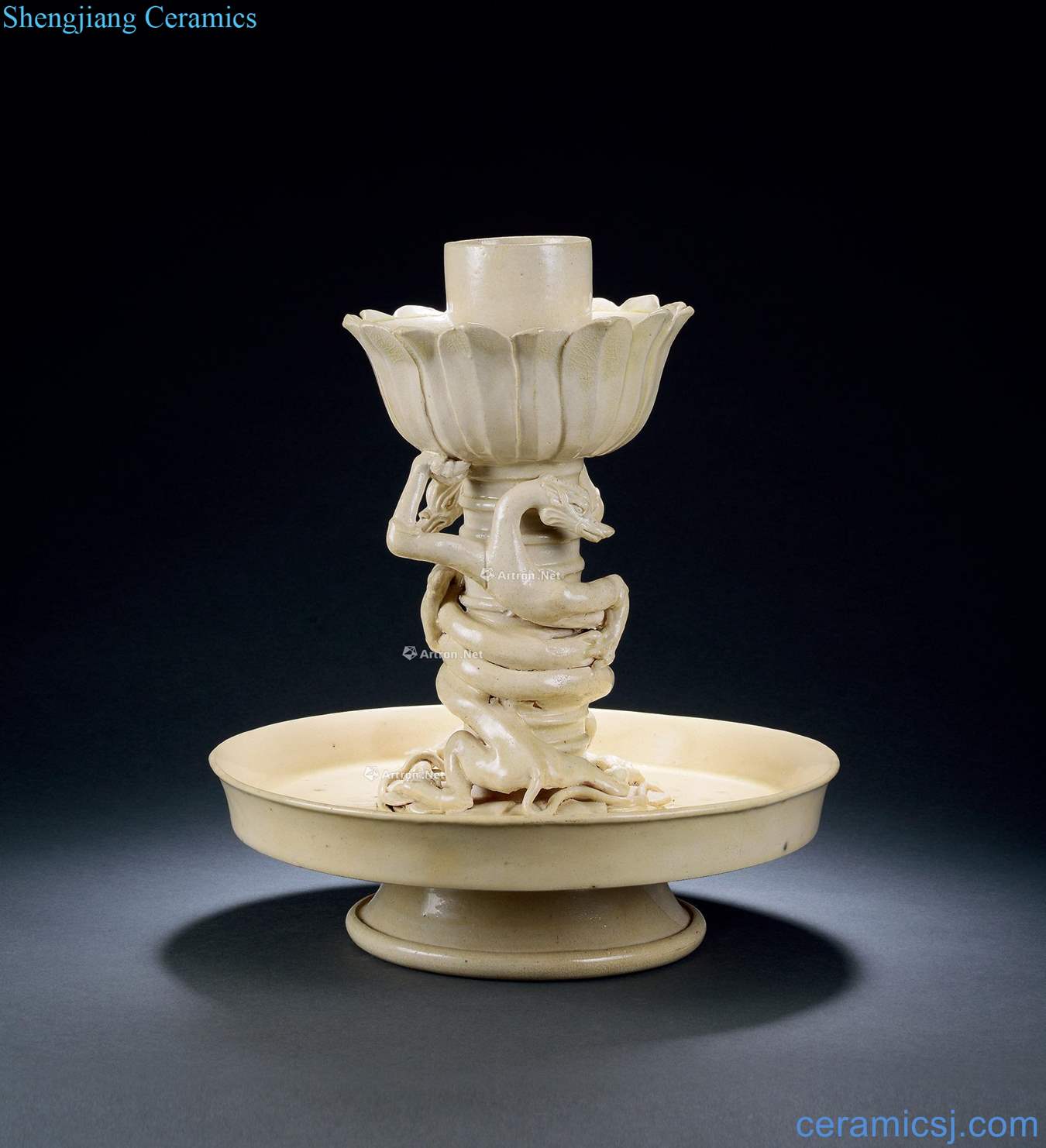 The tang dynasty White glazed ssangyong lotus-shaped candlestick