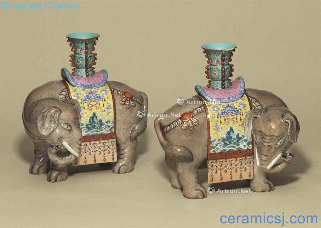 QIANLONG PERIOD (1736-1795), A PAIR OF FAMILLE ROSE CAPARISONED ELEPHANTS