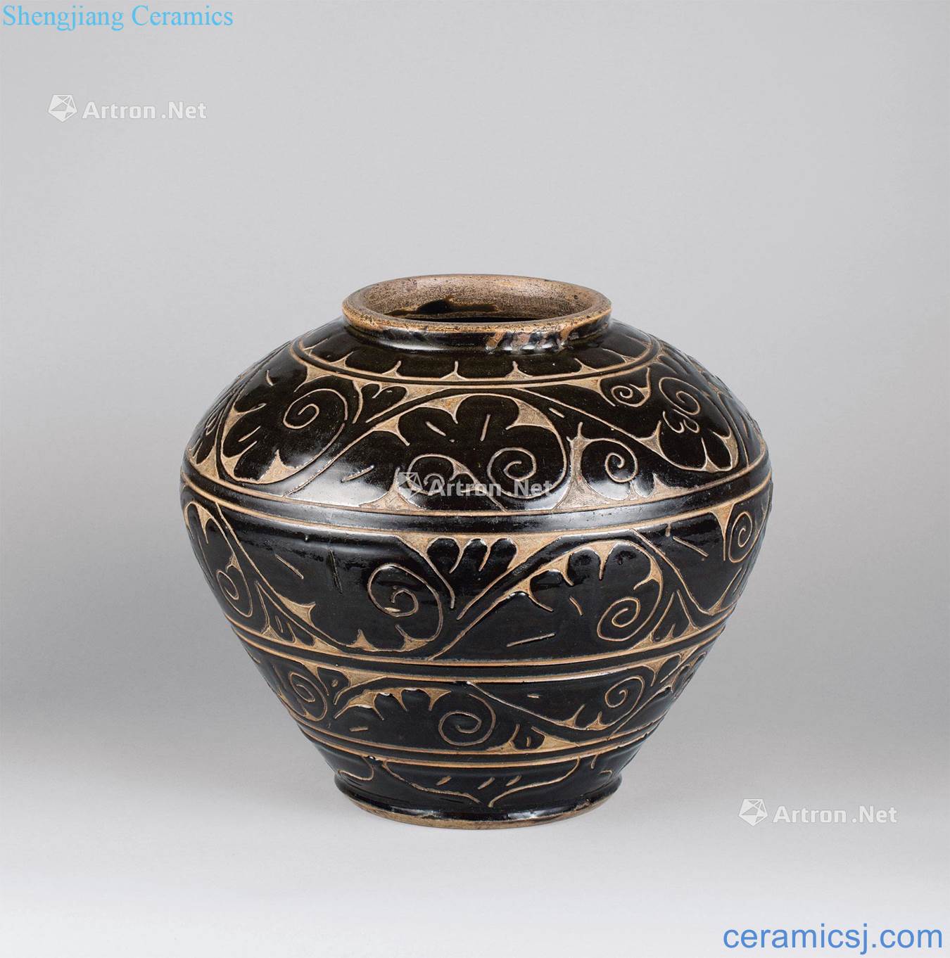 The yuan dynasty (1271-1368) magnetic state kiln carved flower grain tank