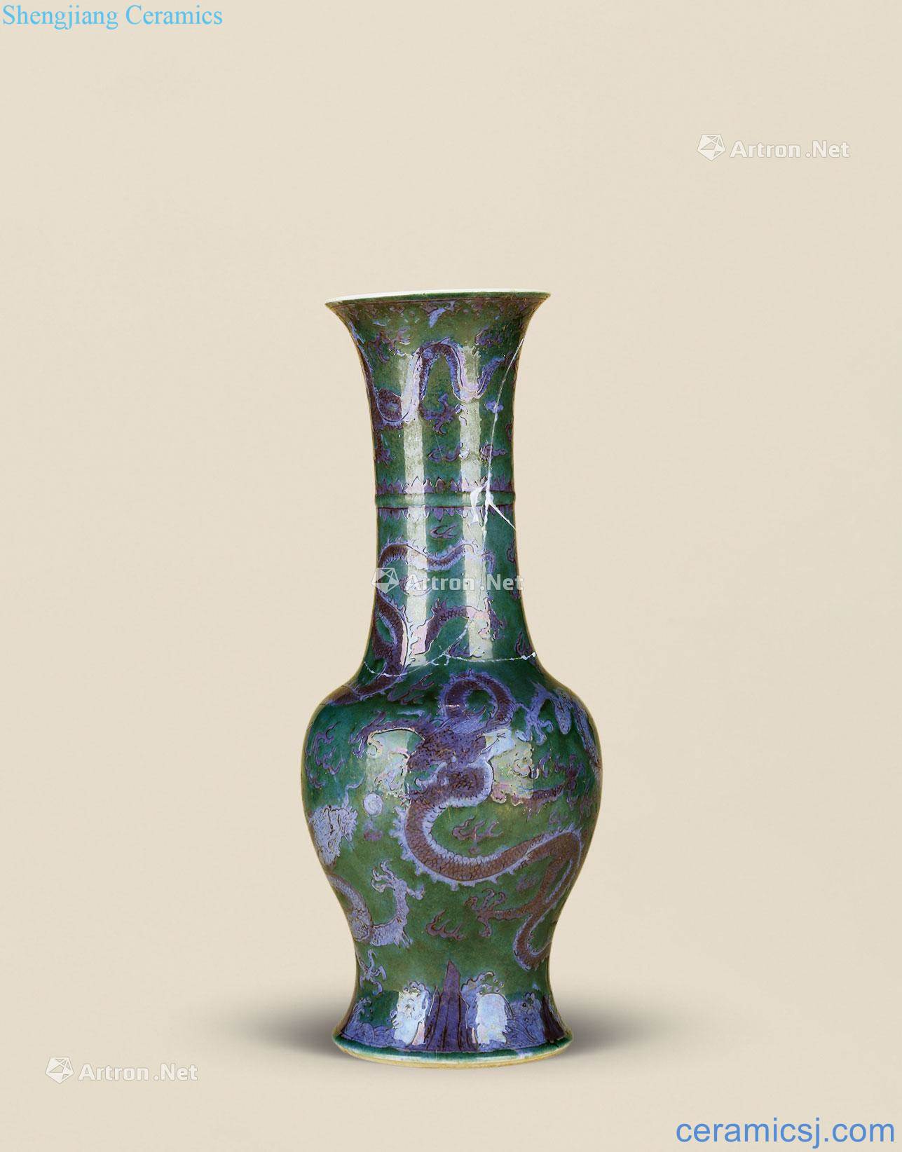 The qing emperor kangxi blackish green to blue and white YunLongWen vase with flowers