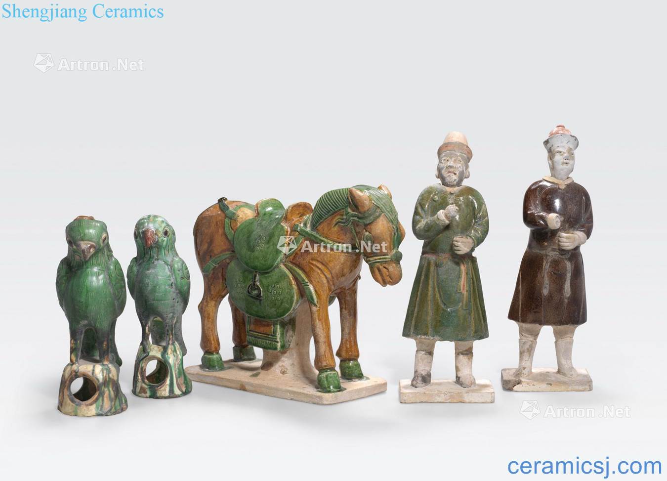Ming dynasty A GROUP OF FIVE SANCAI GLAZED POTTERY ANIMALS AND FIGURES
