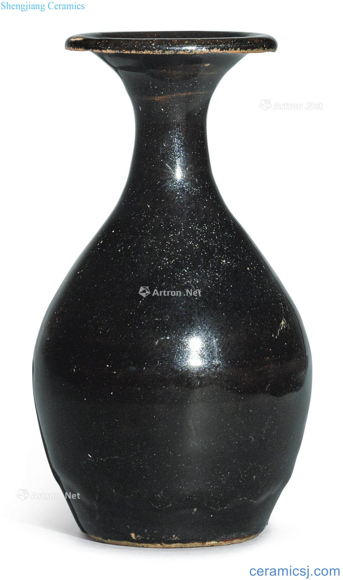 Small gold and black glaze bottle