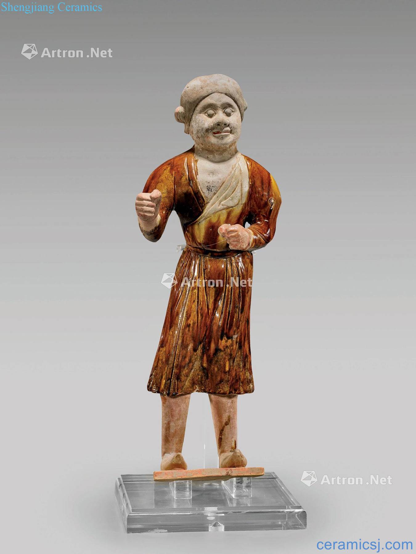 Glazed pottery of tang men supposed as (a)