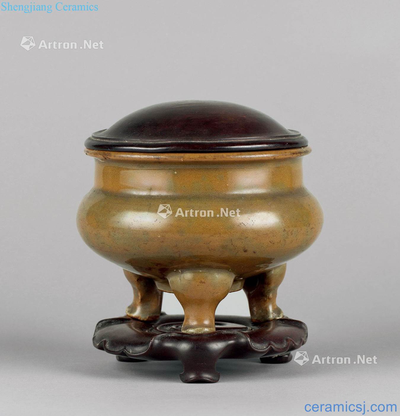 In the Ming dynasty (1368-1644), longquan celadon three-legged incense burner